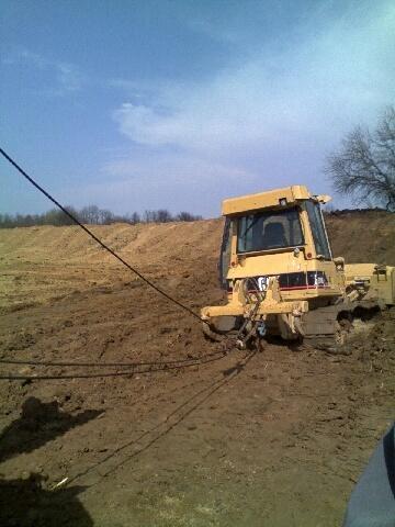 Winching a bulldozer that is stuck